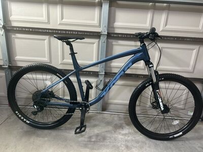 3 Mountain Bikes and 1 Hybrid Bike For Sale