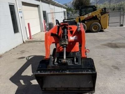 Kubota SCL1000 Mini Track Skid for Rent. Stand on Skid for Backyards