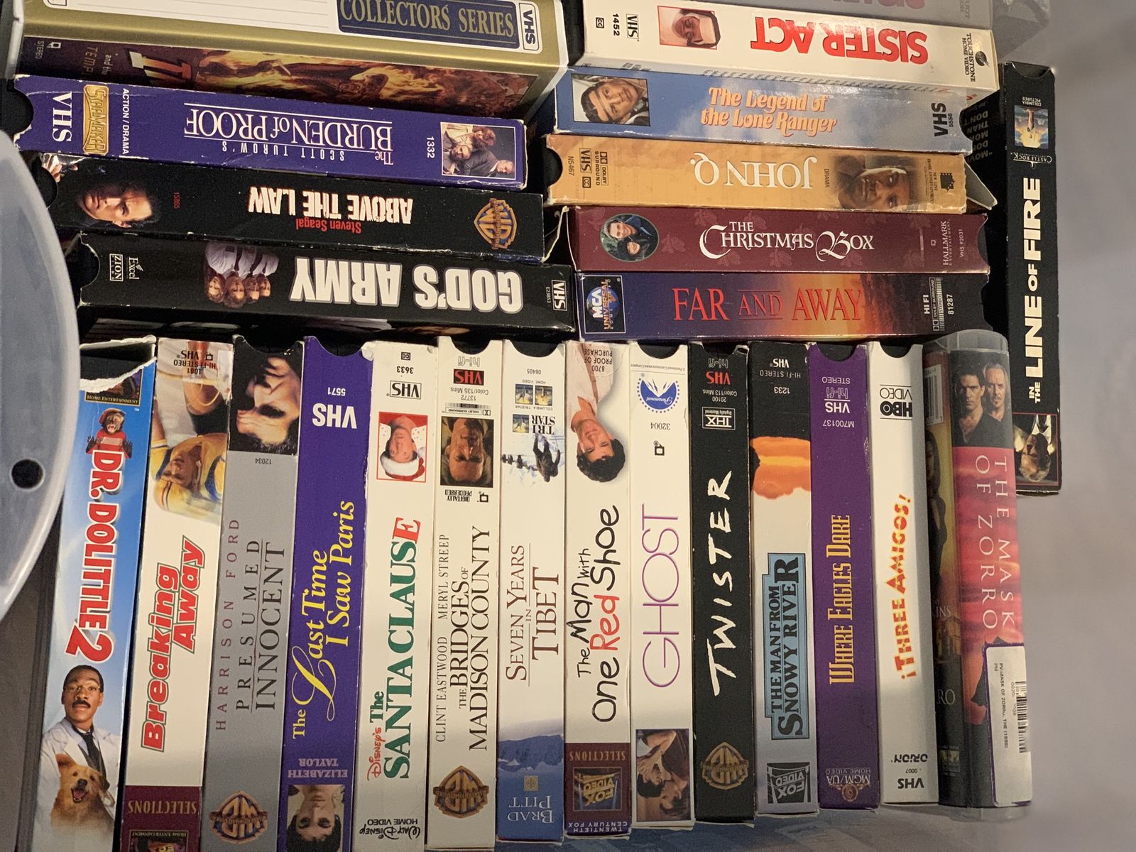 VHS Tapes: Pearl Harbor, Singin' in the Rain (Deluxe), The River, My Fair Lady,  Halloween H20, Jerry Maguire