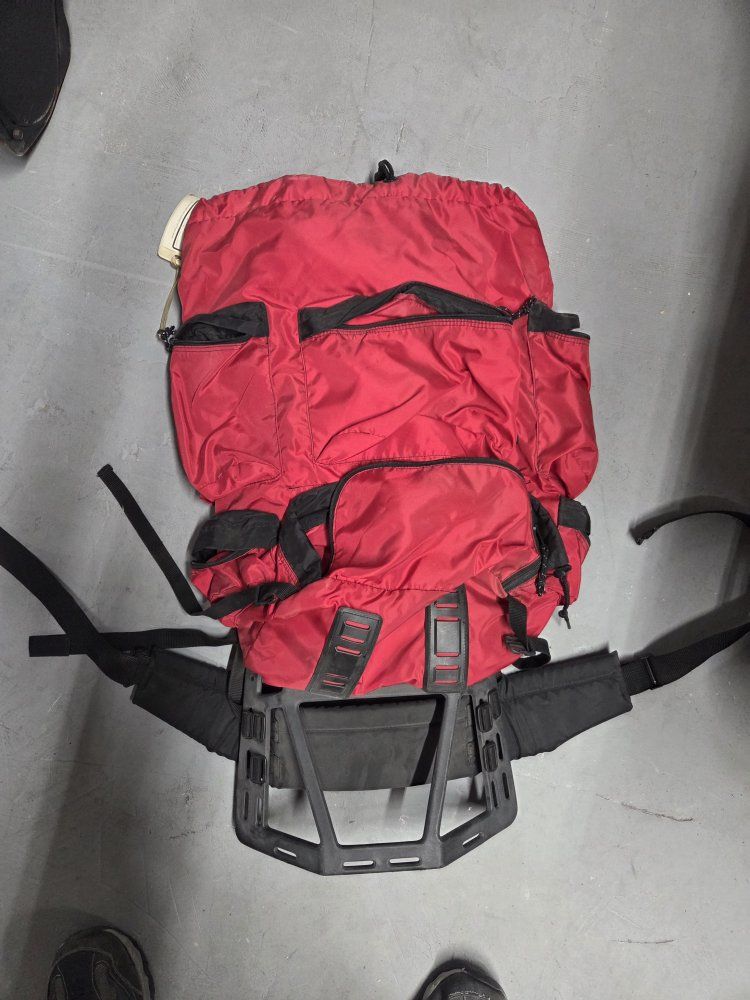 Red External Frame Hiking Backpack - Durable Outdoor Gear with Multiple Pockets