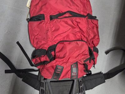 Red External Frame Hiking Backpack - Durable Outdoor Gear with Multiple Pockets