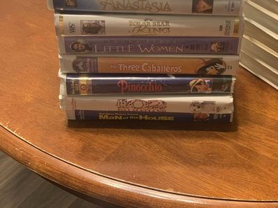VHS Tapes: Pearl Harbor, Singin' in the Rain (Deluxe), The River, My Fair Lady, Halloween H20, Jerry Maguire