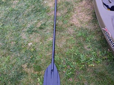 Fisherman ready Sun Dolphin Journey 10 SS Sit-On-Top Kayak with Paddle and pole holders