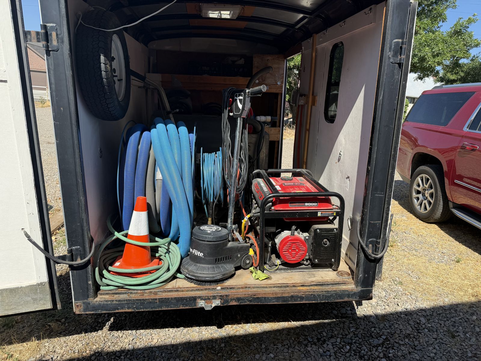 6 x 10 Enclosed trailer comes with a side business
