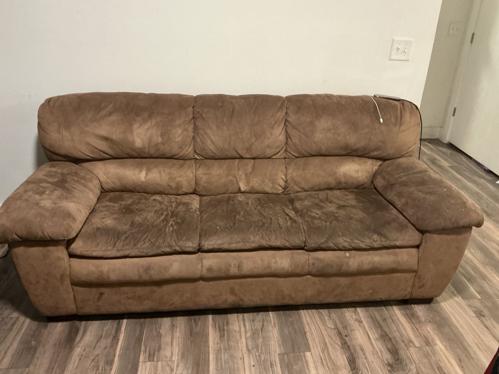 I also have this brown couch that just needs a little cleaning. Honestly, I will take $10 for it. I just need currently everythi