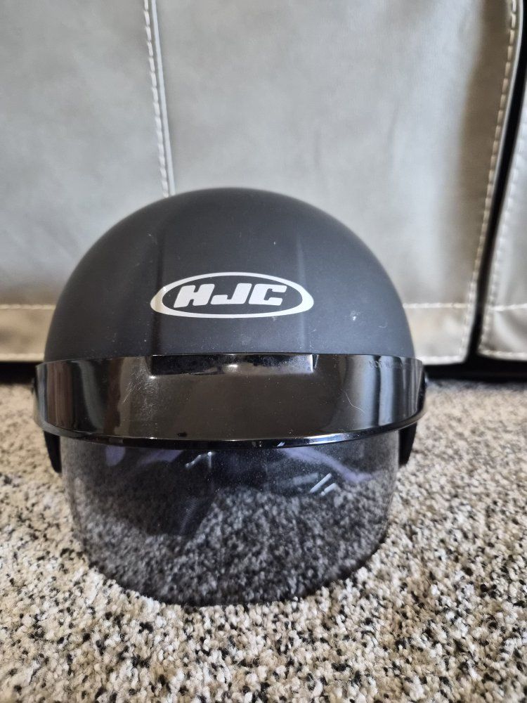 HJC helmet with flip down eye protection.