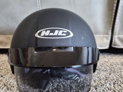 HJC helmet with flip down eye protection.