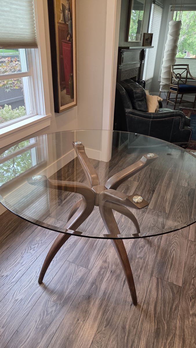 Dining table contemporary 48" Round glass top with wood legs (seats 4 comfortably)