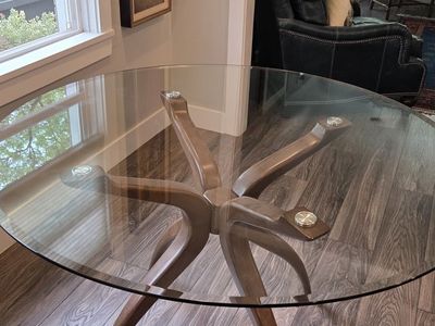 Dining table contemporary 48" Round glass top with wood legs (seats 4 comfortably)
