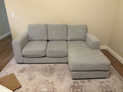 Light Grey Fabric Sofa with Reversible Chaise and Matching Armchair with Ottoman
