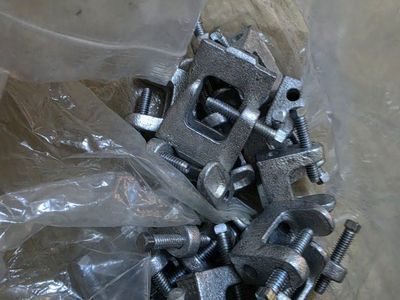 Assorted Metal Fasteners, U-Bolts, and Clips in Box