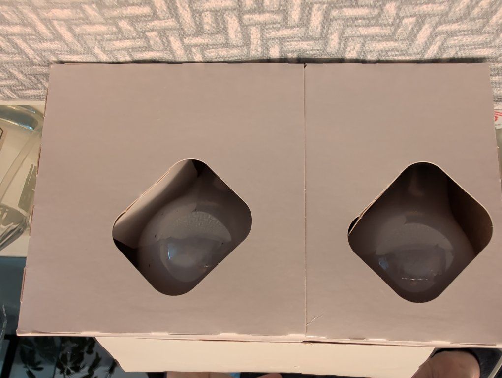 pack of four New incandescent light bulbs sealed