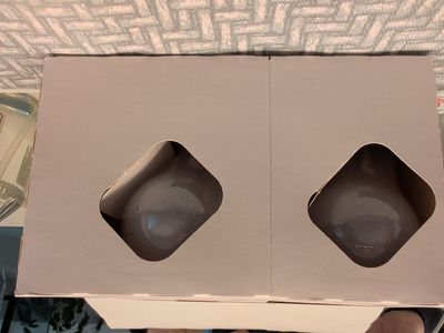 pack of four New incandescent light bulbs sealed