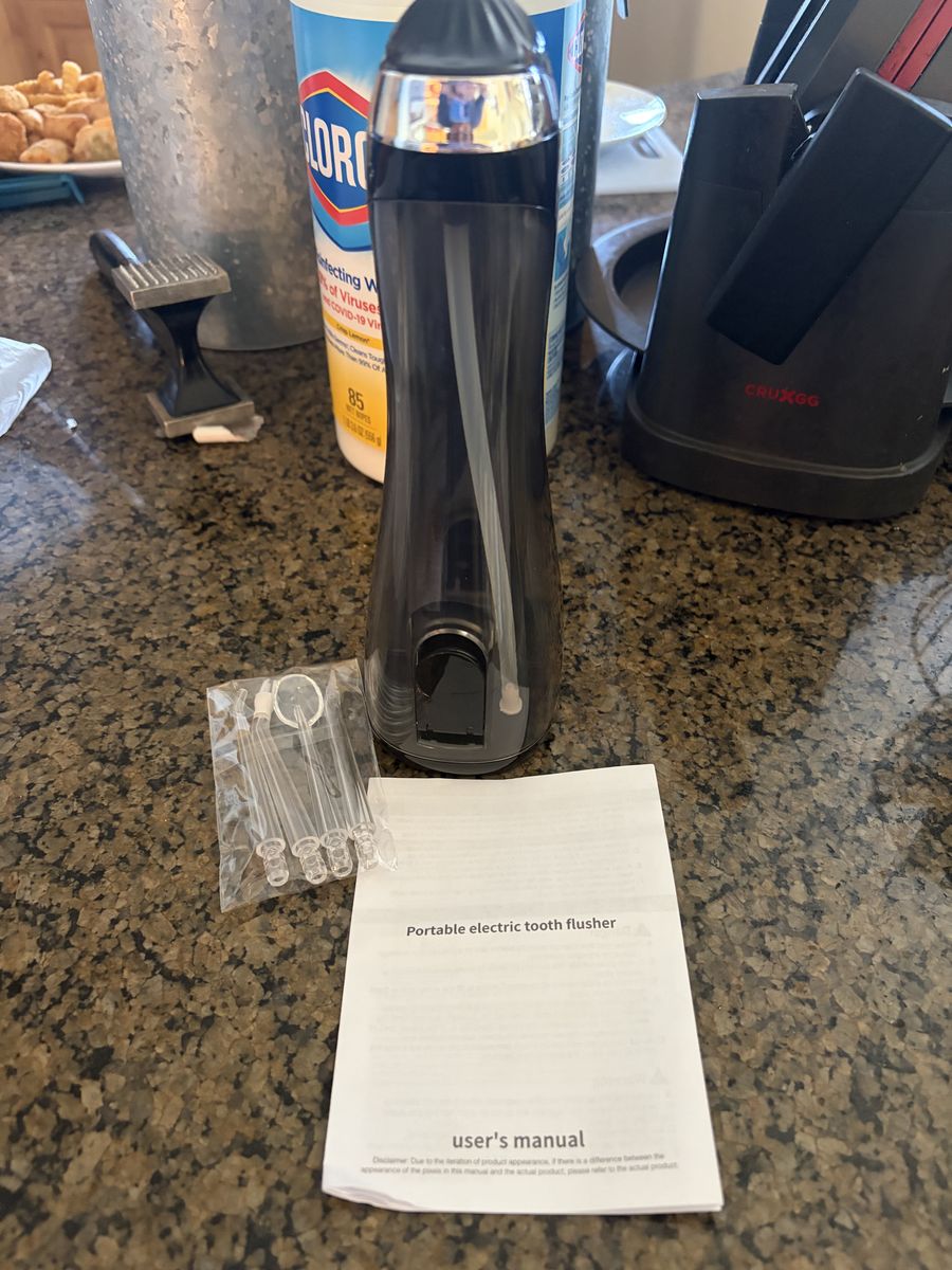 Portable water flosser