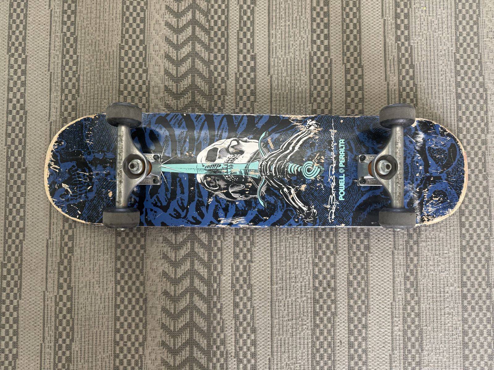 Powell-Peralta Skateboard with Bones Wheels - Blue & Black Skull Design Complete Board
