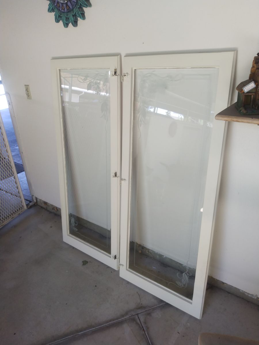 4 cabinet doors with beveled and etched class
