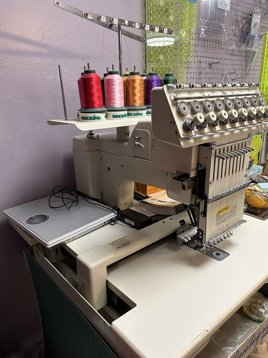 Toyota AD830 - 9 spool Embroidery Machine