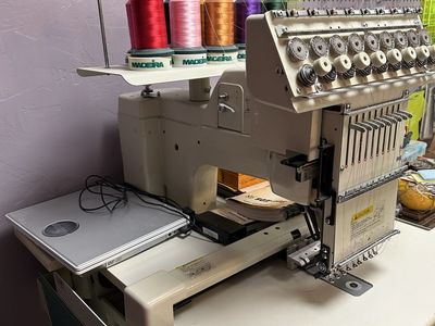 Toyota AD830 - 9 spool Embroidery Machine