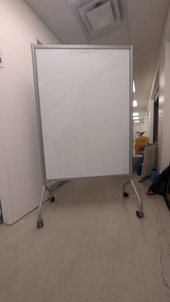 Double sided dry erase board on wheels 