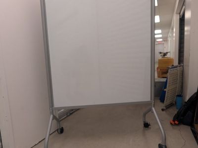 Double sided dry erase board on wheels