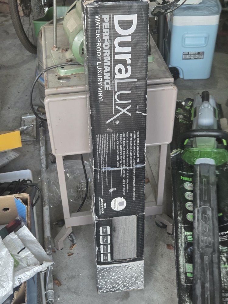 DuraLux Performance Waterproof Luxury Vinyl Plank Flooring - New.