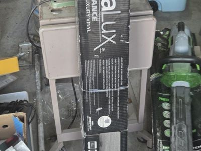 DuraLux Performance Waterproof Luxury Vinyl Plank Flooring - New.