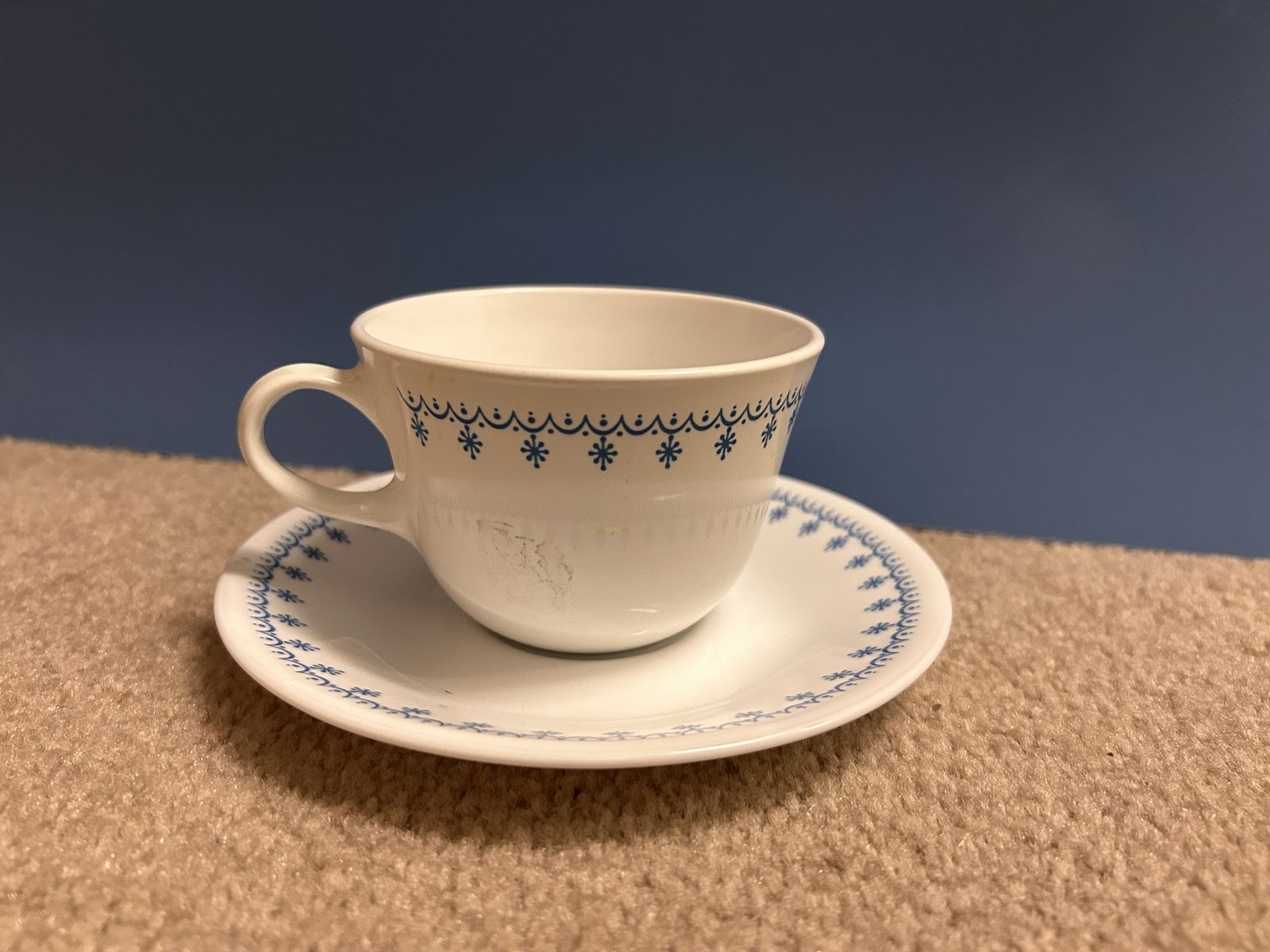 CORNINGWARE CORELLE SNOWFLAKE BLUE TEACUP AND SAUCER