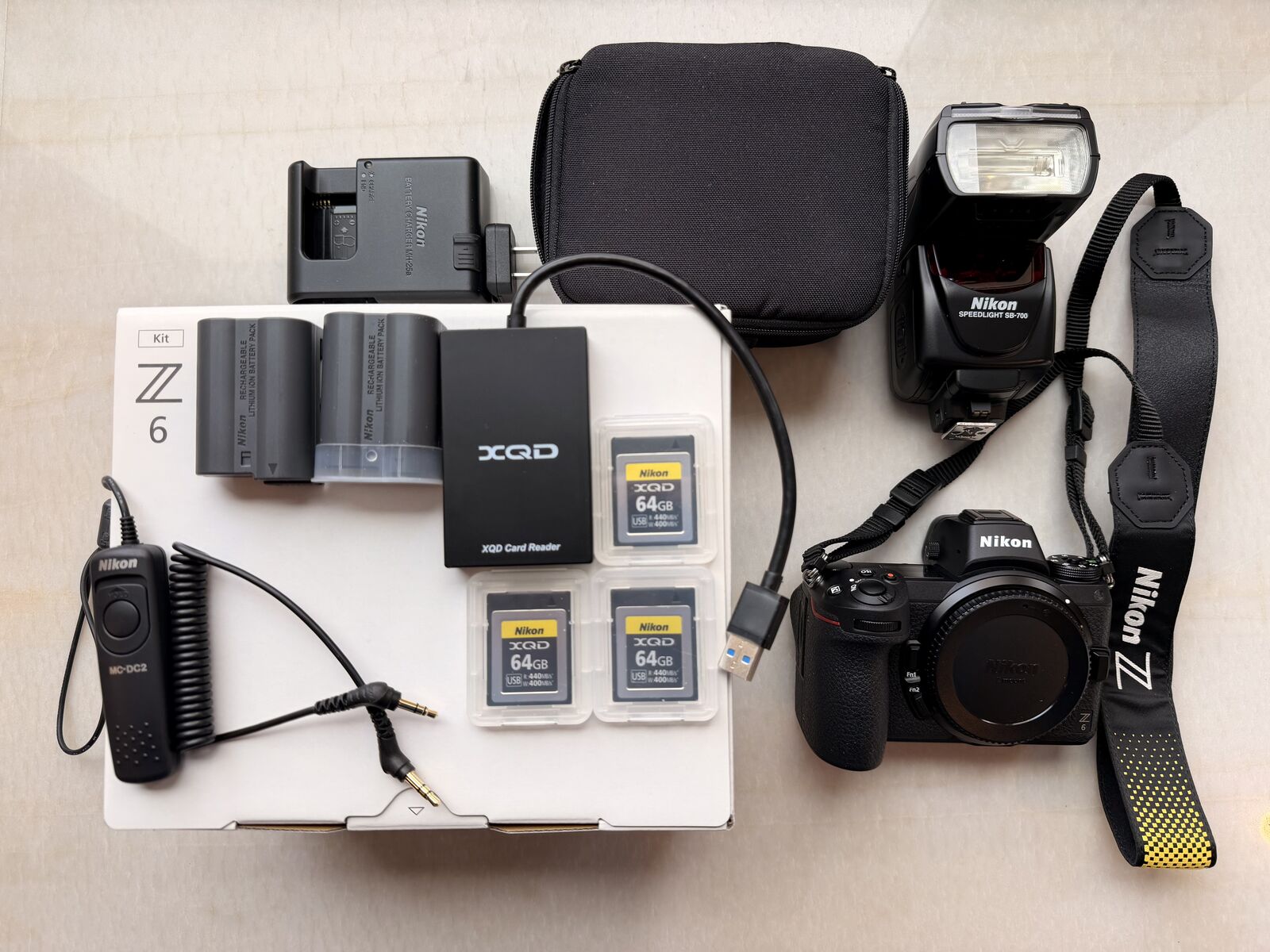Nikon Z6 w/flash, two batteries, three 64GB XQD cards, USB 3 card reader, and shutter remote