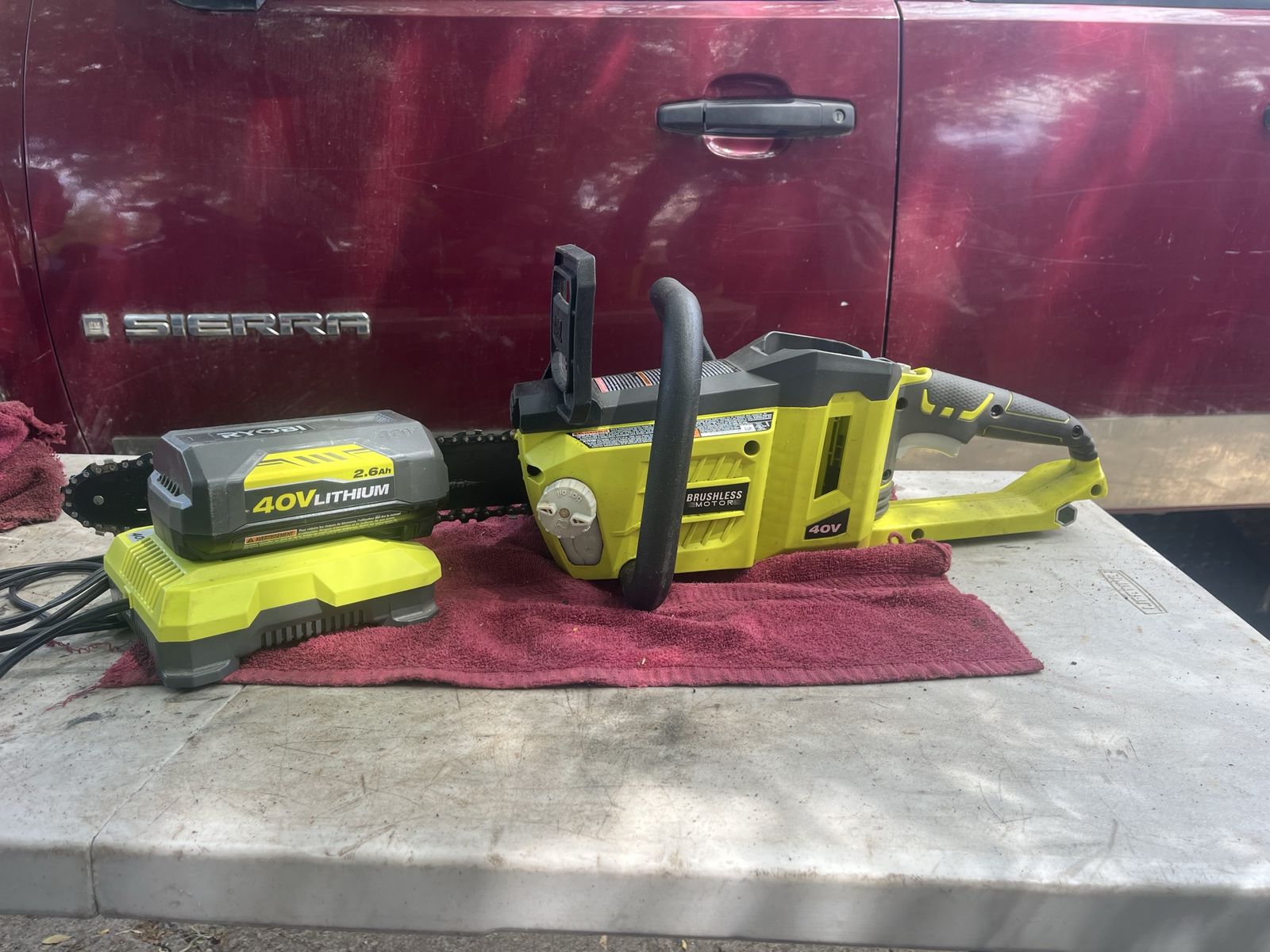 RYOBI 40V HP Brushless 14 inch Cordless Chainsaw with 4.0 Ah Battery and Charger