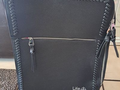 New black suitcase backpack