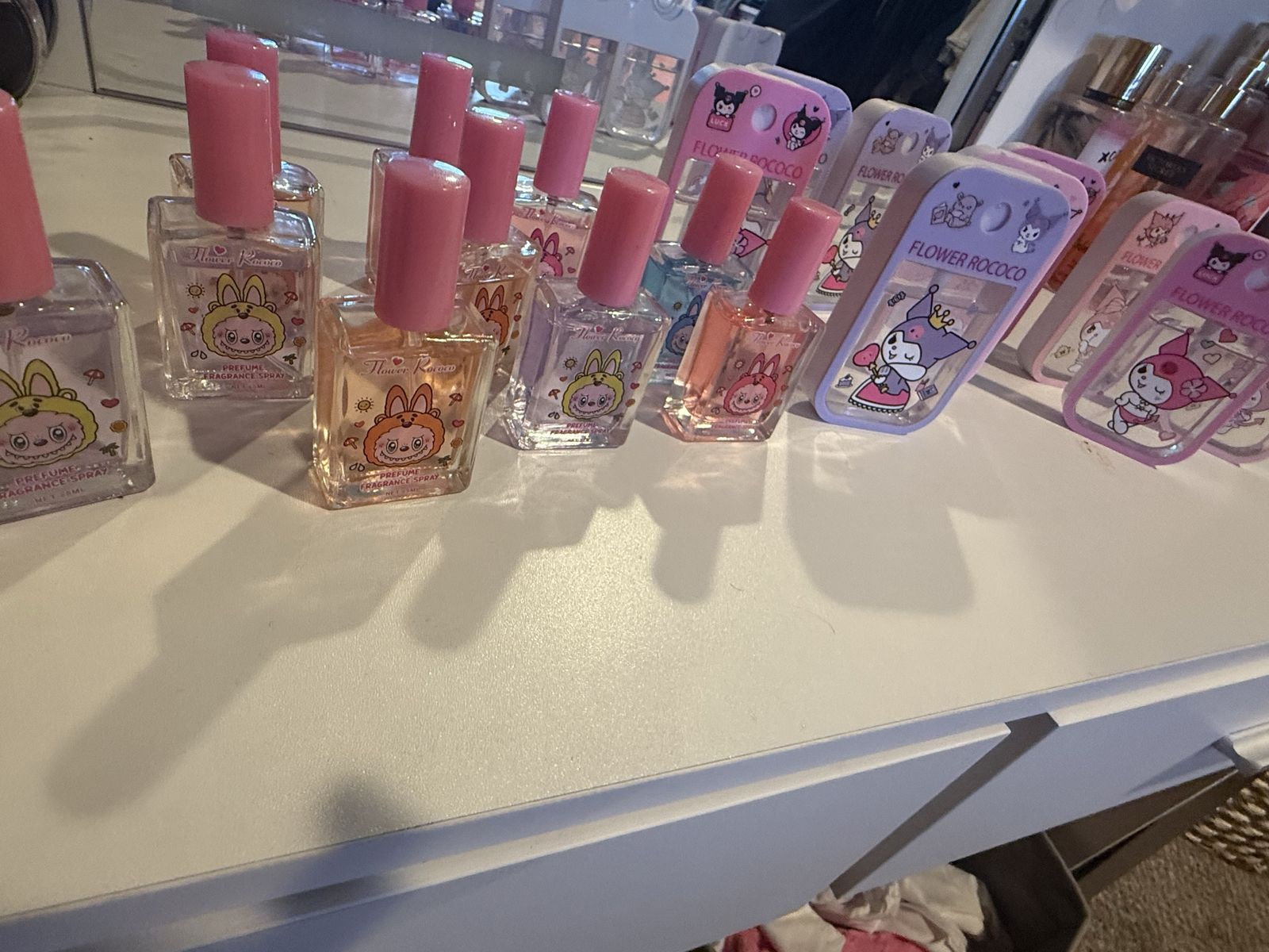 Perfum mini labubu and hello kitty