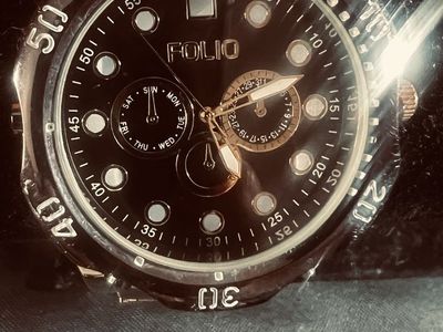 Folio Chronograph Style Watch with Black Dial and Rose Gold Tone Bracelet
