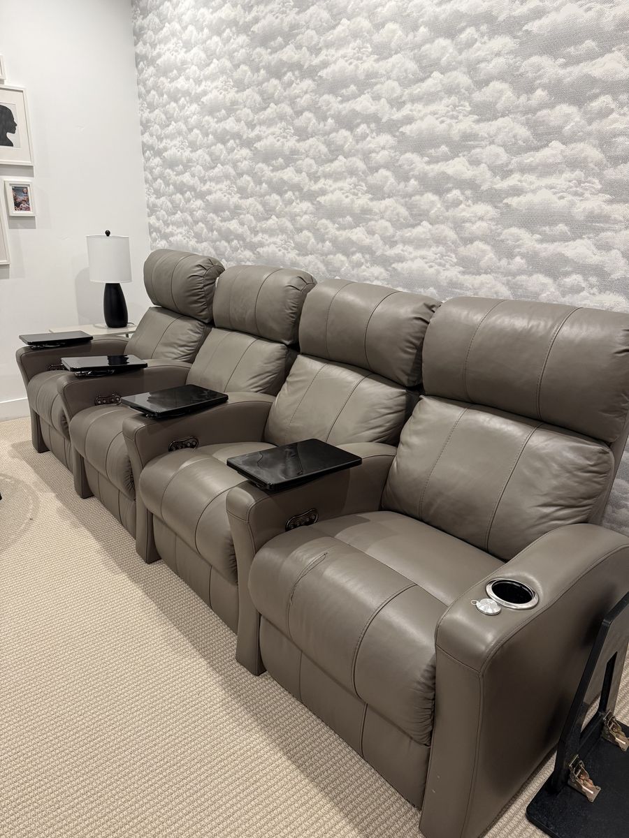 Four electronic theater chairs