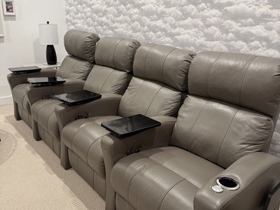 Four electronic theater chairs