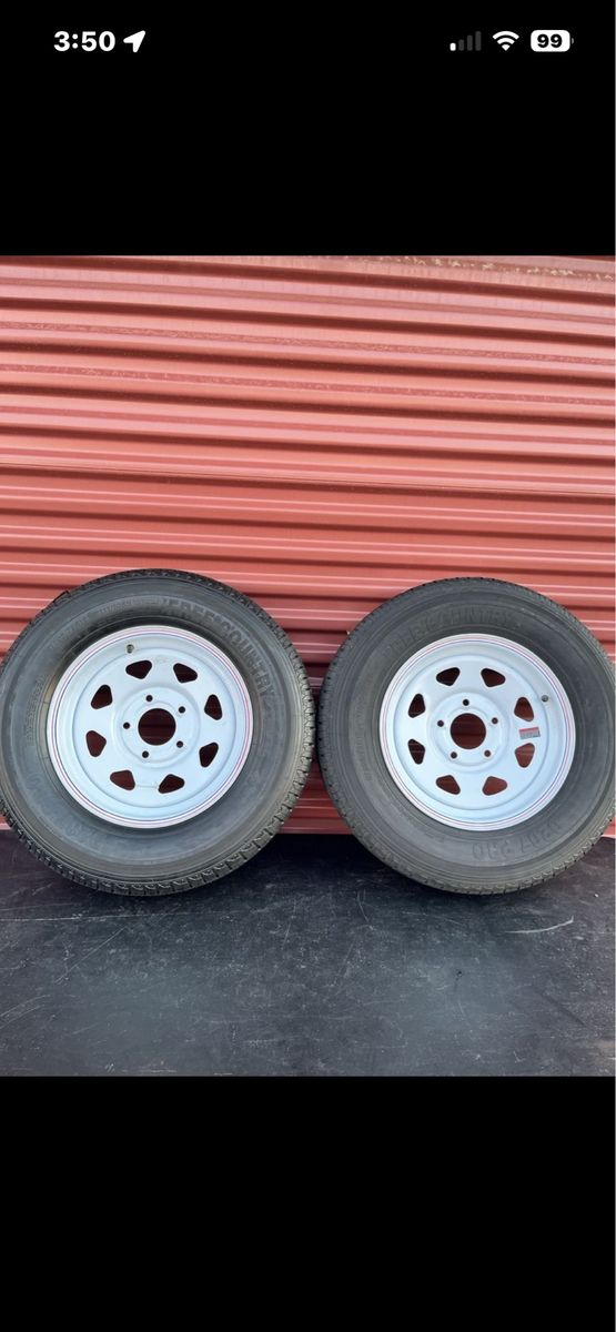 Set of 2 Free Country ST 205/75 R 15 Trailer Tires Mounted on New White Spoke Wheels 10 Ply E Load 5 on 4.5.      Brand New 