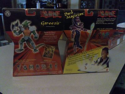 Yu-Gi-Oh! action figures Dark Magician and Garoozi