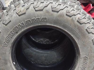 Set of Yokohama Geolander AT X/D 10 ply tires. 295/70r18
