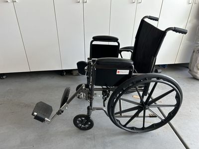Drive Medical Black Wheelchair Manual Mobility Aid w/ Footrests, Armrests, & Large Wheels