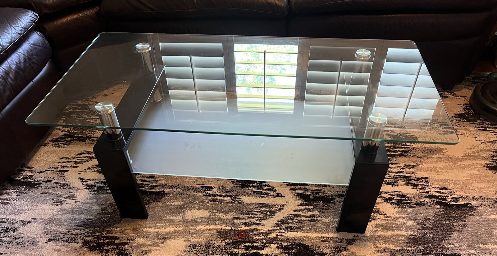 Modern Glass Coffee Table with Black Wood Legs and Chrome Accents