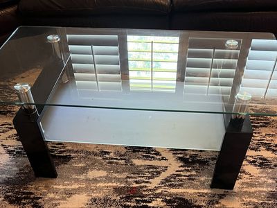 Modern Glass Coffee Table with Black Wood Legs and Chrome Accents