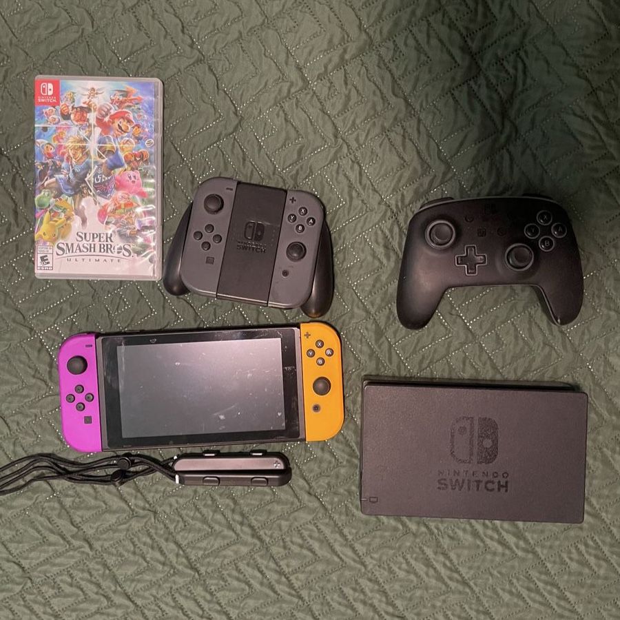 Nintendo switch W/ MarioKart and Super Smash Bros