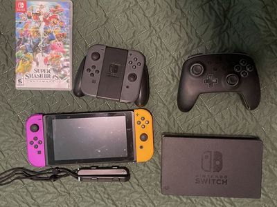Nintendo switch W/ MarioKart and Super Smash Bros