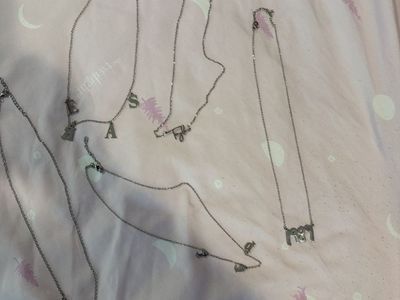 Lot of 5 Silver-Tone Necklaces Featuring Various Letter and Word Pendants