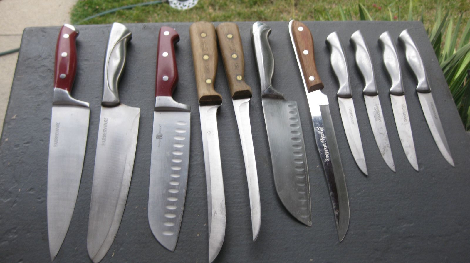 11 decent knives plus 30 others including kitchen impliments