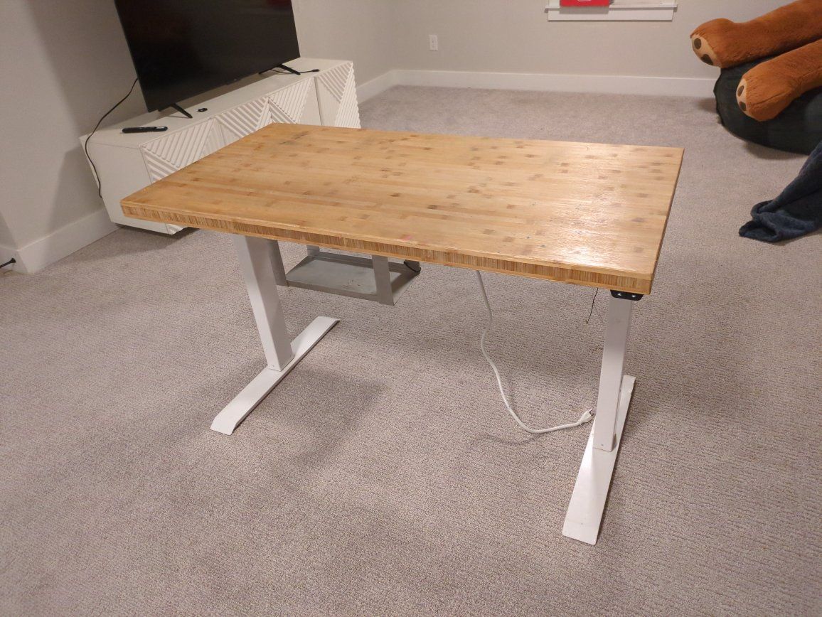 2 foot x 4 foot raise and lower desk electric