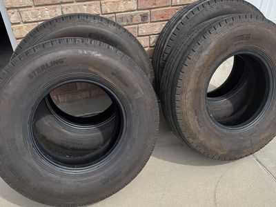 Four 235-85-16 TRAILER TIRES