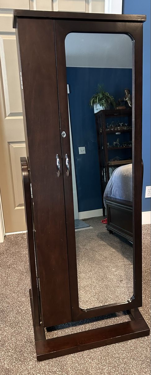 Standing mirrored jewelry armoire cabinet
