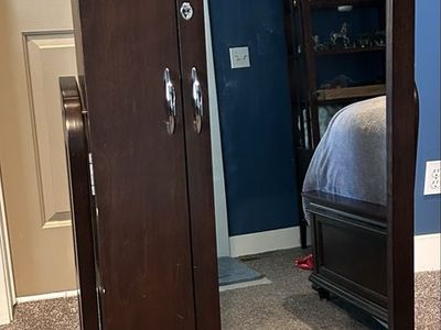 Standing mirrored jewelry armoire cabinet