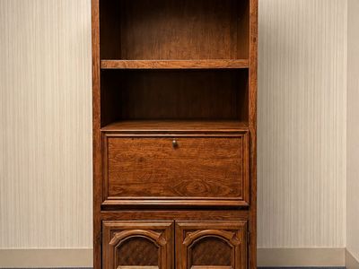 1970s combination bookcase and drop-front bureau secretary desk designed in the Mediterranean / Spanish Revival style