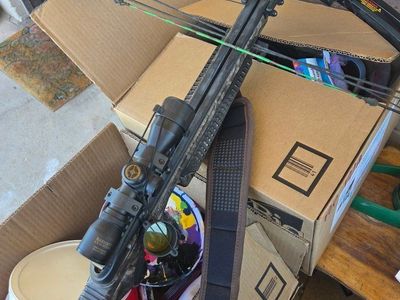 cross bow / comes with scope, and cocking rope.